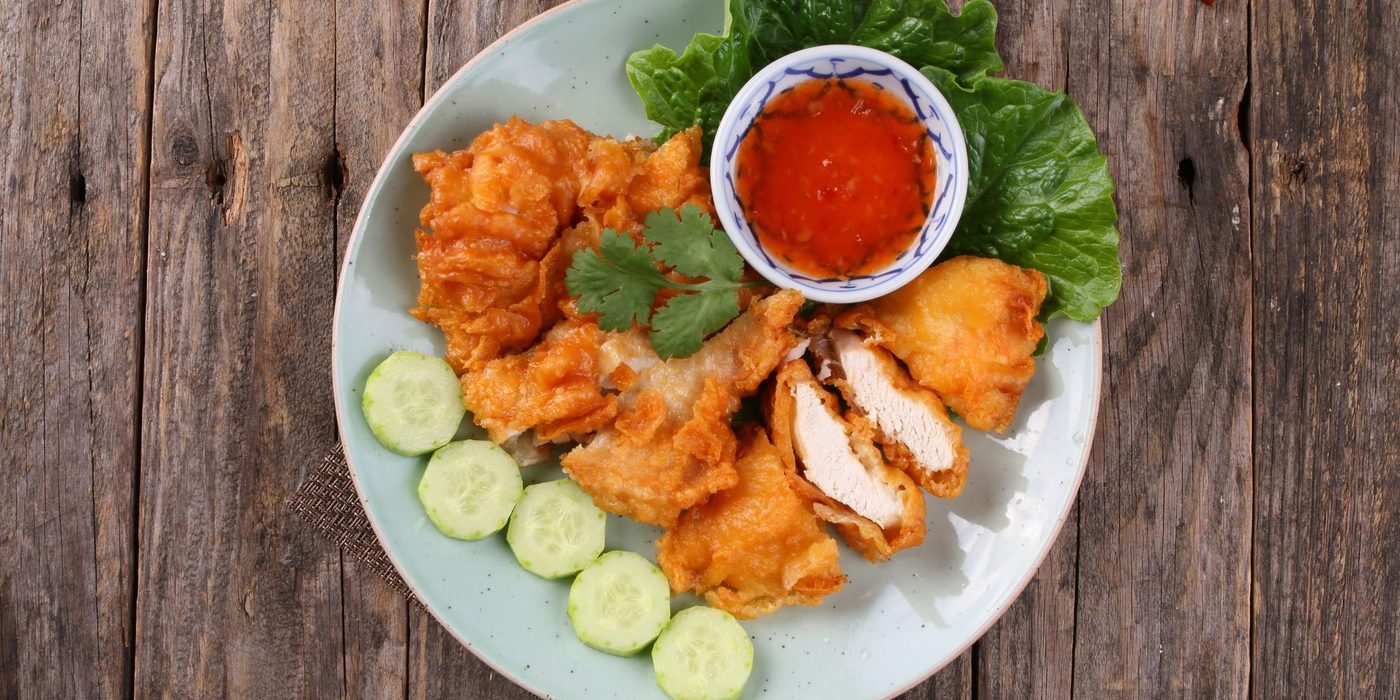 An illustrative plate of fried chicken